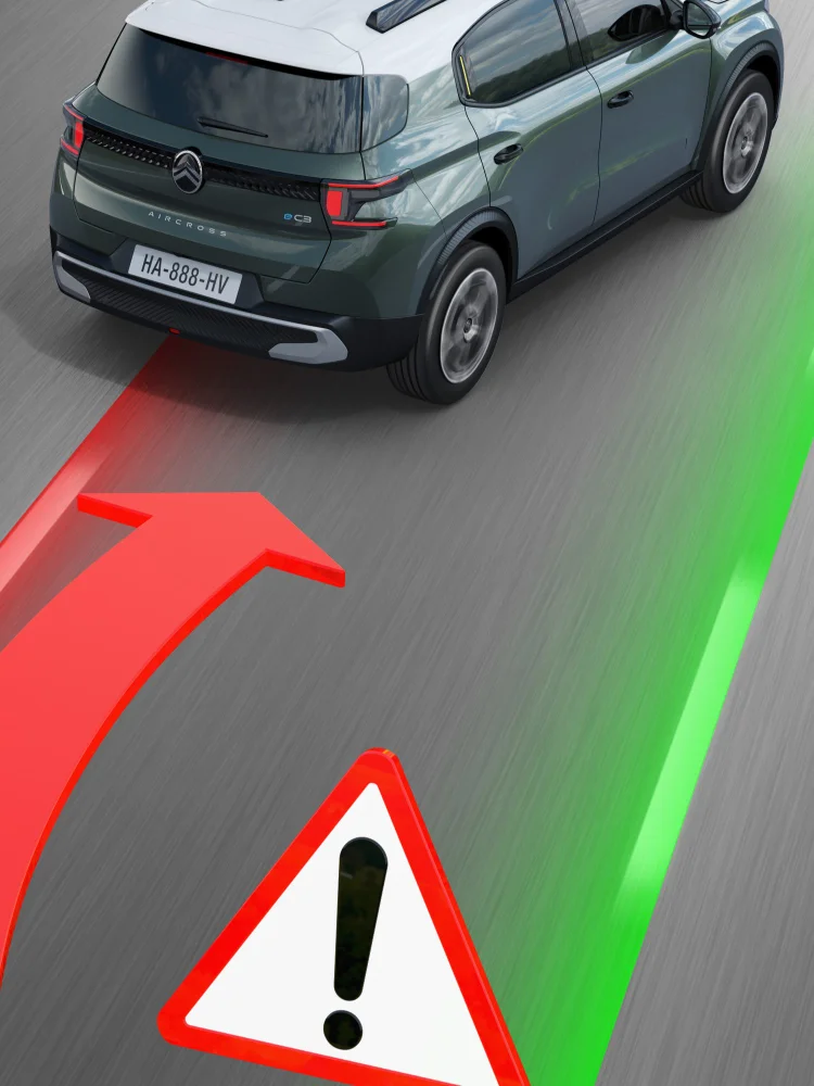 Citroën SUV met rijstrookwaarschuwing en geprojecteerde rode en groene rijstrookvisuals op de weg.